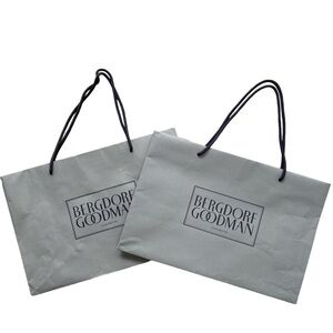 2 Bergdorf Goodman shopping bags.